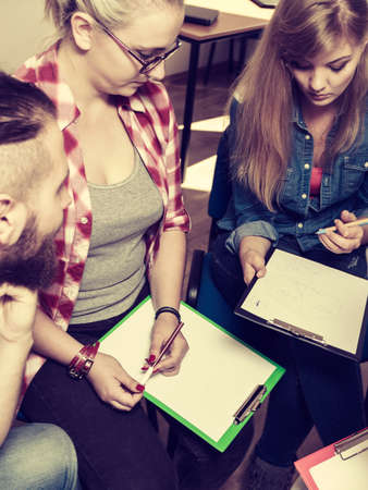 Team collaboration meeting start up concept. Male and female diversity young people studying working...