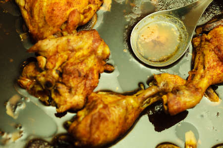 Delicious dinner food meals concept. Detailed closeup of cooked chicken meat in stewpanの写真素材