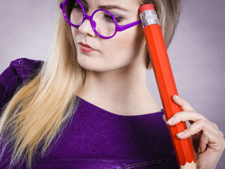 Person confused thinking seeks a solution. Pensive thoughtful student girl or business woman female...