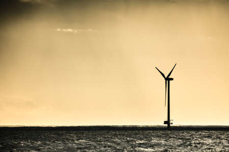 Wind turbines generator farm for renewable sustainable and alternative energy production along coast...
