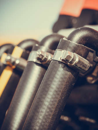 Industrial detailed pneumatic, hydraulic machinery concept. Pump made of steel on machine closeup.の写真素材