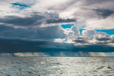 Stormy seascape sea horizon and sky. Natural composition of nature. Landscape. View from ship boat.の写真素材