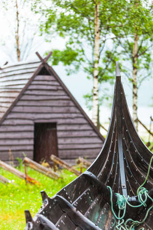 Part of old wooden viking boat in norwegian nature. Tourism and traveling conceptの写真素材