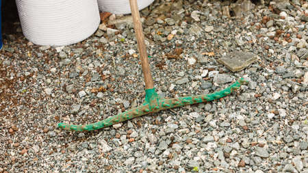 Hanging fork harrows, steel fan rake for leaves and grass. Gardening equipment, concept.の写真素材