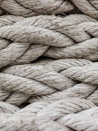 Old fashioned harbor marina sail boat ropes. Yachting details and objects concept.の写真素材