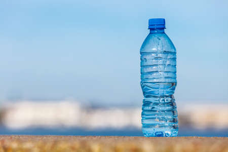 Water plastic bottle outdoor on sea shore nobodyの写真素材