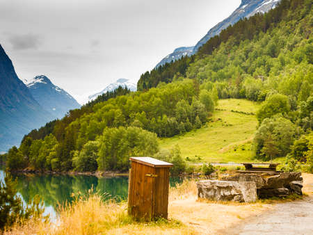 Picnic site table and benches with view at norwegian mountains, Scandinavia Europe.