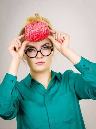 Business woman wearing jacket and eyeglasses intensive thinking finding great problem solution...