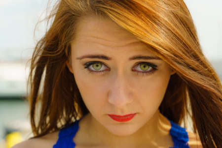 Human expressions concept. Closeup of woman making sad face looking depressed and shy.