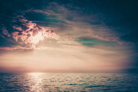 Colorful sunset over evening sea horizon, clouds sky. Tranquil scene. Natural background. Landscape....