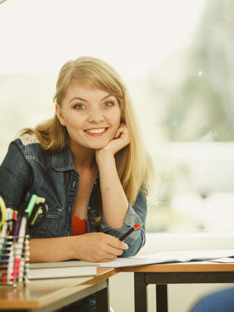 Man student sitting in class studying and educating waiting for teacher. Creating new ideas by young peopleの写真素材