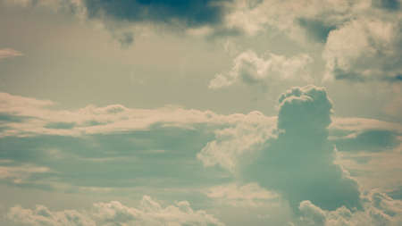 Beautiful outdoor shot of summer bright blue sky and many white clouds.の写真素材