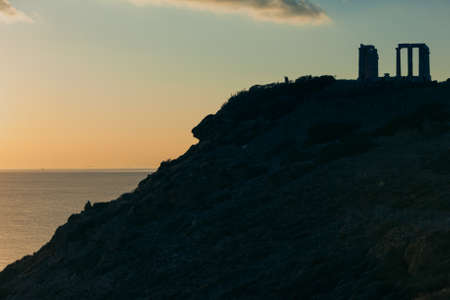 Greece Cape Sounion. Ruins of an ancient temple of Poseidon at sunset. Travel destinations.の写真素材