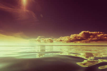 Colorful sunset over evening sea horizon, clouds sky. Tranquil scene. Natural background. Landscape. View from yachtの写真素材