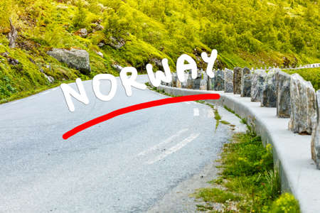 Road winding through norwegian mountains. Beautiful landscape. Travel and tourism.の写真素材