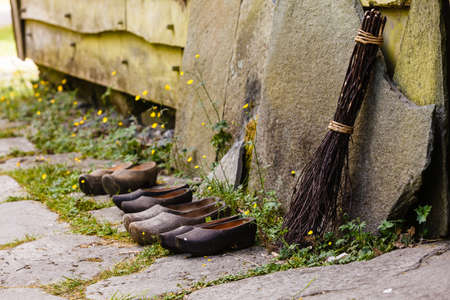 Regional tradition and culture, handmade concept. Wooden dutch shoes, traditional clogs footwear...