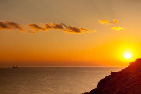 Scenic sunrise or sunset over sea surface. Beautiful natureの写真素材