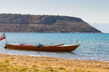 Active lifestyle sport concept. Canoe outdoor on sea shore in summer time. Blue water sunny day.