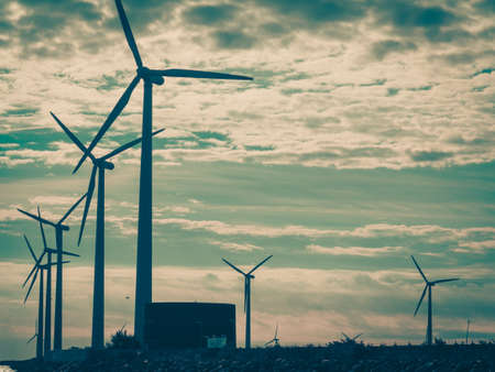 Wind turbines generator farm for renewable sustainable and alternative energy production along coast baltic sea near Denmark. Eco power, ecology.の写真素材