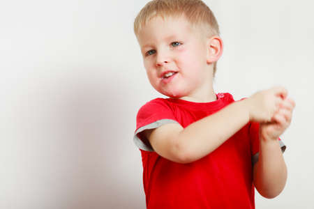 Face expressions, children concept. Portrait of happy kid boy making funny silly facesの写真素材