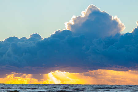 Beautiful seascape evening Baltic sea sunset horizon and cloudy sky. Tranquil scene. Natural...
