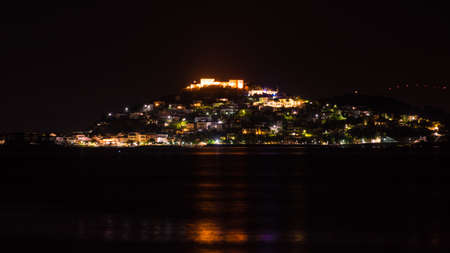 Night scene of Astros town with old ruined Castle of Zafeiropouloi, Greece Peloponnese Arcadia. Travel adventure conceptのeditorial素材