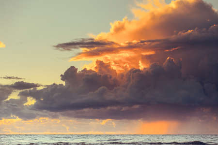 Beautiful seascape evening Baltic sea sunset horizon and cloudy sky. Tranquil scene. Natural...