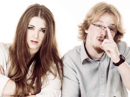 Woman being irritated looking displeased at her friend or boyfriend being silly, fooling around and...