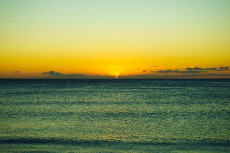Scenic sunset or sunrise over sea surface. Natural scenery, beautiful landscapeの写真素材