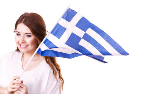 Brunette curly long hair young woman with greek waving flag, national symbol of Greece, isolated on white.の写真素材