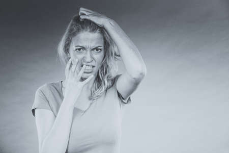 Negative human emotions, headache, face expressions, mental disorders concept. Stressed, frustrated,...