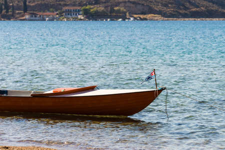 Active lifestyle sport concept. Canoe outdoor on sea shore in summer time. Blue water sunny day.の写真素材