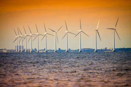 Wind turbines generator farm for renewable sustainable and alternative energy production along coast...