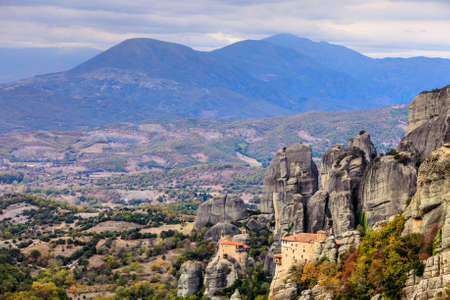 Monasteries on cliff in Meteora, Monastery of Rousanou and St. Nicholas Anapausas, Thessaly Greece....