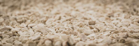 Detailed close up of texture pattern with brown black little stones and rocks. Abstract background concept.の写真素材