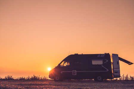 Tourism vacation and travel. Camper van and morning landscape at sunrise in Greece
