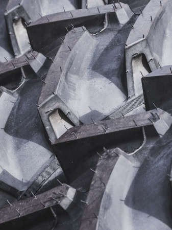Tires treads changing, automotive concept. Detailed closeup of rubber tire wheel surface.の写真素材