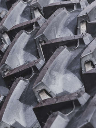 Tires treads changing, automotive concept. Detailed closeup of rubber tire wheel surface.