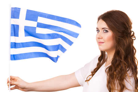 Brunette curly long hair young woman with greek waving flag, national symbol of Greece, isolated on whiteの写真素材