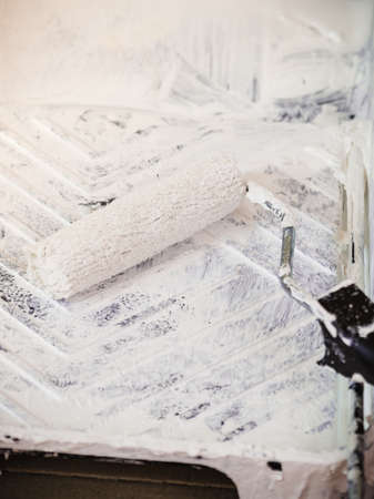 Home renovation, walls color change, diy concept. White paint with essentials equipment.の写真素材