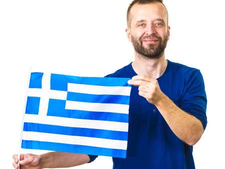 Man with greek waving flag, national symbol of Greece, isolated on whiteの写真素材