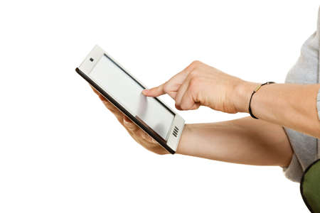 Man using tablet pc computer, hands only. New technology and modern devices concept.
