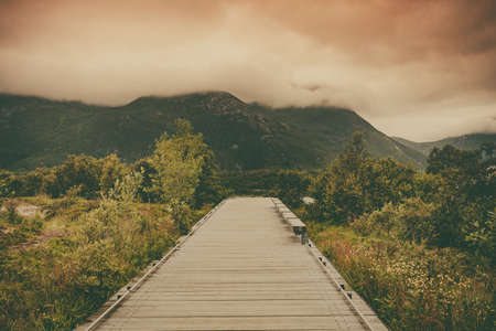 Fjord mountains landscape from Austnesfjorden rest area on Sildpollen bay. Lofoten islands Austvagoya, Norway. Tourist location.の写真素材