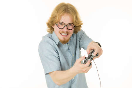 Nerd geek young adult man playing on the video console holding game pad. Gaming gamers concept.