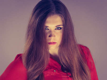 Angry pretty attractive woman being pissed off. Very frustrated lady having brown hair.