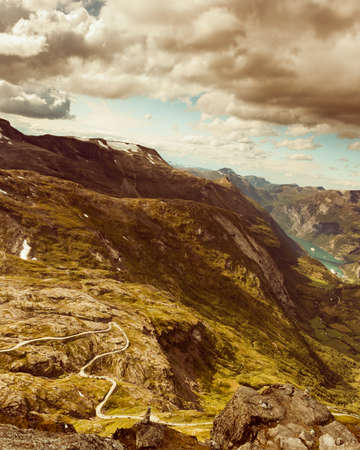Tourism vacation and travel. Fantastic view on Geirangerfjord and mountains landscape from Dalsnibba viewpoint, Geiranger Skywalk platform, Norway.の写真素材