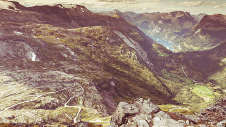 Tourism vacation and travel. Fantastic view on Geirangerfjord and mountains landscape from Dalsnibba viewpoint, Geiranger Skywalk platform, Norway.の写真素材