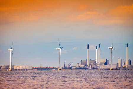 Wind turbines generator farm for renewable sustainable and alternative energy production along coast baltic sea near Denmark. Eco power, ecology.の写真素材