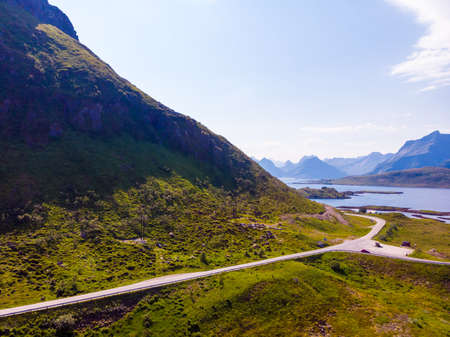 Norwegian scenic landscape on Lofoten archipelago. Road trough islands and sea. National tourist route 10 Norway. Aerial viewの写真素材