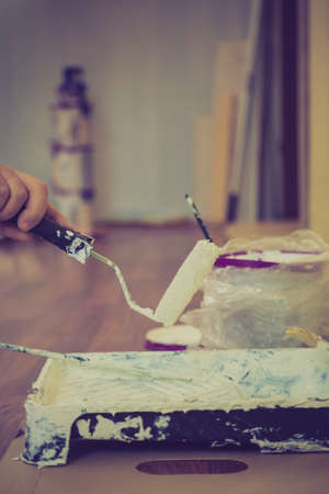 Home renovation, walls color change, diy concept. White paint with essentials equipment.の写真素材